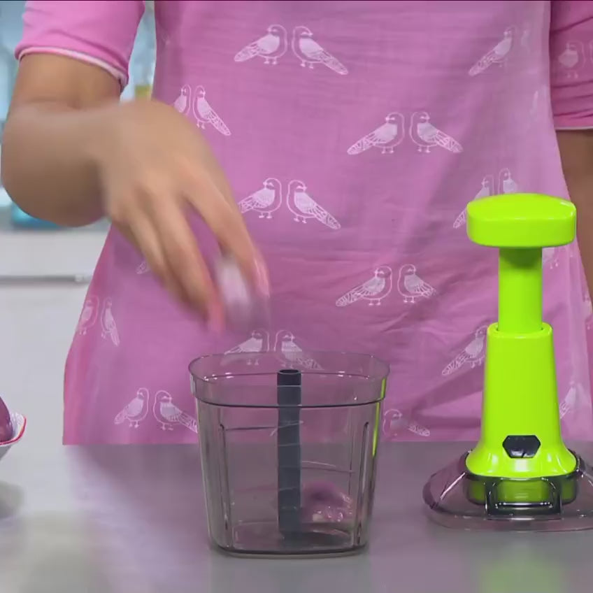 Load video: 🥗 Chop smarter, not harder!India’s favorite Manual Steel Food Chopper makes kitchen prep lightning-fast ⚡No tears. No mess. Just quick &amp; clean chopping every time!🍅 Cut, mix, and blend in seconds!